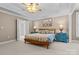 Serene bedroom featuring a cozy bed, neutral carpet, and ample space at 150 Canopy Oak Ln, Statesville, NC 28625