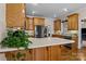 Spacious eat-in kitchen with light countertops, stainless steel appliances and hardwood floors at 150 Canopy Oak Ln, Statesville, NC 28625