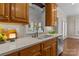 Traditional-style kitchen featuring wood cabinets, stainless steel appliances and an undermounted sink at 150 Canopy Oak Ln, Statesville, NC 28625