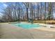 Enjoy this private backyard with a refreshing pool and well-maintained landscaping, perfect for outdoor enjoyment at 150 Canopy Oak Ln, Statesville, NC 28625