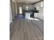 Open-concept kitchen features an island, stainless steel appliances, and ample cabinet space at 195 Bethesda Rd, Statesville, NC 28625
