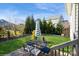 Backyard featuring patio furniture and manicured lawn perfect for outdoor entertaining and relaxation at 2112 Balting Glass Dr, Indian Trail, NC 28079