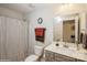 Bathroom featuring a shower with curtain, modern vanity, and neutral colors at 2112 Balting Glass Dr, Indian Trail, NC 28079
