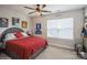 Bedroom with window, ceiling fan, and sports-themed decorations at 2112 Balting Glass Dr, Indian Trail, NC 28079