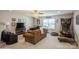 Spacious bonus room with carpet, ceiling fan, comfortable furniture, and TV at 2112 Balting Glass Dr, Indian Trail, NC 28079