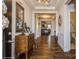 Inviting foyer with hardwood floors, decorative accents, and a view into the living room at 2112 Balting Glass Dr, Indian Trail, NC 28079