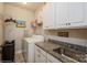 Functional laundry room with granite countertops, washer, and dryer at 2112 Balting Glass Dr, Indian Trail, NC 28079