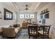 Cozy office space with ample light, neutral colors, and hardwood floors at 2112 Balting Glass Dr, Indian Trail, NC 28079