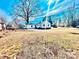 Spacious backyard of home with trees providing ample shade at 2123 Ravendale St, Kannapolis, NC 28083