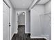The hallway leads into a room with vaulted ceilings and seamless flooring at 2123 Ravendale St, Kannapolis, NC 28083