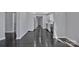 Open floor plan featuring hardwood floors flowing from living area into the kitchen at 2123 Ravendale St, Kannapolis, NC 28083