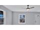 Bright living room featuring hardwood floors, a modern ceiling fan, and a white entry door at 2123 Ravendale St, Kannapolis, NC 28083