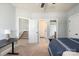 Bedroom featuring access to the stairwell, bathroom, and closet with view of bed and desk at 2144 Tatton Hall Rd, Fort Mill, SC 29715