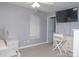 Cozy bedroom featuring a well-lit space, neutral carpet, with a dresser; ideal for comfort and relaxation at 2345 Nuthatch Dr, Rock Hill, SC 29732