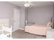 Cozy bedroom featuring a well-lit space, neutral carpet, with a chair and dresser; ideal for comfort and relaxation at 2345 Nuthatch Dr, Rock Hill, SC 29732