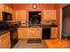 Warm kitchen featuring updated appliances, granite countertops, and ample cabinet space at 2345 Nuthatch Dr, Rock Hill, SC 29732