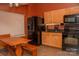 Kitchen with appliances and wood table with benches at 2345 Nuthatch Dr, Rock Hill, SC 29732