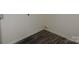 Modern flooring and a minimalist aesthetic in a well lit room at 252 Mills Ave, Troutman, NC 28166