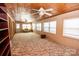 Spacious bonus room featuring wood ceiling, bright windows, and comfortable neutral carpeting at 255 Sharon School Rd, Statesville, NC 28677