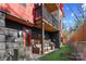 This home boasts a rear patio and deck off the back with a grassy yard at 2710 N Davidson St, Charlotte, NC 28205