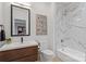 This bathroom features a vessel sink, a marble shower, and modern fixtures at 2710 N Davidson St, Charlotte, NC 28205