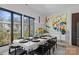 Elegant dining area with modern table, chairs, and large windows offering ample natural light at 2710 N Davidson St, Charlotte, NC 28205