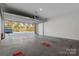 The large two car garage has ample room for vehicles and storage at 2710 N Davidson St, Charlotte, NC 28205