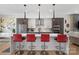 Stylish kitchen with island seating, pendant lighting, and modern appliances, perfect for both cooking and entertaining at 2710 N Davidson St, Charlotte, NC 28205