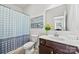 Bathroom featuring a patterned shower curtain, neutral paint, and modern faucet at 27467 Cinderella Cir, Lancaster, SC 29720