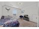 Bedroom with a large window and modern decor at 27467 Cinderella Cir, Lancaster, SC 29720