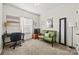 Bedroom with neutral carpeting, art on the walls, and lots of natural light at 27467 Cinderella Cir, Lancaster, SC 29720
