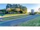 Edgewater community entrance with stone signage and well-maintained landscaping at 27467 Cinderella Cir, Lancaster, SC 29720