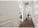 Bright hallway with hardwood floors leading to various rooms in the home at 27467 Cinderella Cir, Lancaster, SC 29720
