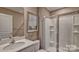 Clean bathroom with a white vanity, framed mirror, and a glass-enclosed shower at 3060 Ora Smith Rd, Lincolnton, NC 28092