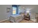This cozy bedroom features modern decor, neutral walls and a window with natural light at 3060 Ora Smith Rd, Lincolnton, NC 28092
