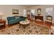 Comfortable living room with hardwood floors, area rug, and traditional decor at 316 Robmont Rd, Charlotte, NC 28270