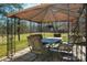 Backyard patio featuring tented table and chair set, view of the back yard and trees at 4151 Ivystone Ct, Charlotte, NC 28277