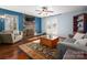 Inviting living room with stone fireplace, hardwood floors, and plenty of natural light at 4151 Ivystone Ct, Charlotte, NC 28277
