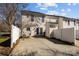 Backyard features a concrete patio, white fence, and access to the home through french doors at 604 Atherton Way, Rock Hill, SC 29730