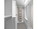 Walk-in closet with adjustable shelving, drawers, and hanging rods for optimal storage at 604 Atherton Way, Rock Hill, SC 29730