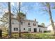 Backyard view showing trees, sky, and exterior home details at 7201 Brassy Creek Ln, Charlotte, NC 28269