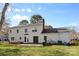 Spacious backyard featuring a patio and lush green lawn at 7201 Brassy Creek Ln, Charlotte, NC 28269