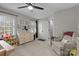 Bedroom with a neutral color scheme, a dresser, a closet, and a chair at 7201 Brassy Creek Ln, Charlotte, NC 28269