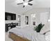 Bedroom with vaulted ceiling featuring a TV, a doorway to the bathroom, and two closets at 7201 Brassy Creek Ln, Charlotte, NC 28269
