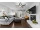 Spacious living room with fireplace and sliding door access at 7201 Brassy Creek Ln, Charlotte, NC 28269