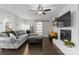 Spacious living room with fireplace and sliding door access at 7201 Brassy Creek Ln, Charlotte, NC 28269