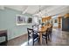 Airy dining room with plenty of natural light and views overlooking nature at 725 Skytop Rd, Waxhaw, NC 28173