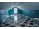 Bright bonus room with blue walls, checkerboard floor, and natural light at 802 Lewis St, Gastonia, NC 28054