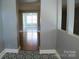 Hallway featuring unique flooring and a view into the next room at 802 Lewis St, Gastonia, NC 28054