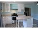 Bright kitchen featuring stainless steel appliances, white cabinets and an island at 802 Lewis St, Gastonia, NC 28054